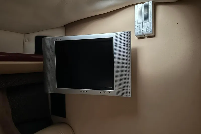 Slide: The Image of Sharp Aquos TV in 2004 Cobalt 360 Cruiser interior. - 11