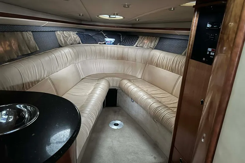 Slide: The Image of Luxurious interior of a 2004 Cobalt 360 Cruiser with plush seating and elegant design. - 16