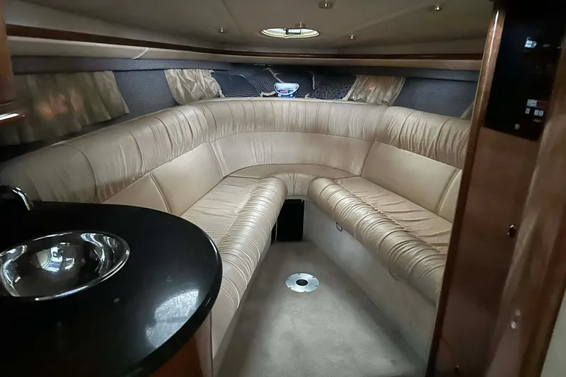 Slide: The Image of Luxurious interior of a 2004 Cobalt 360 Cruiser with plush seating and modern amenities. - 21