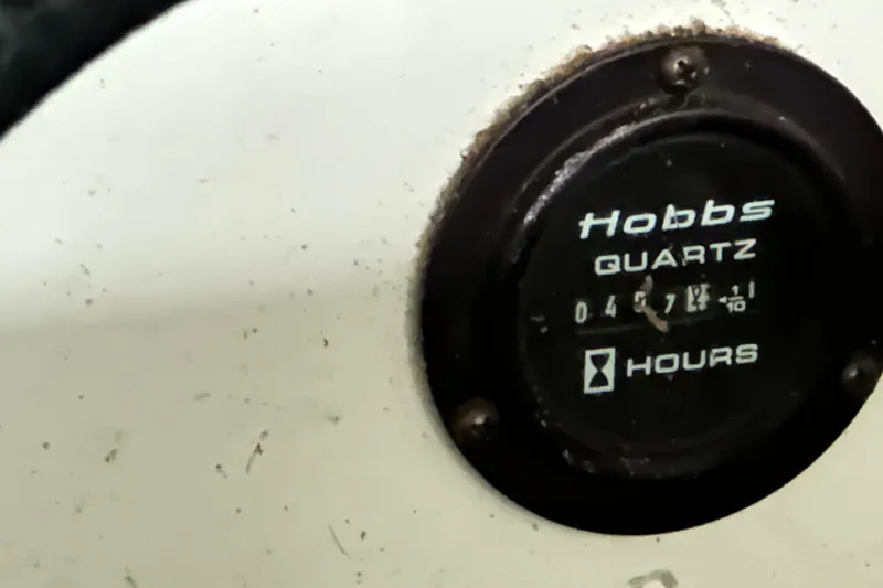 Slide: The Image of Hobbs Quartz hour meter on 2004 Cobalt 360 Cruiser, displaying usage hours. - 5