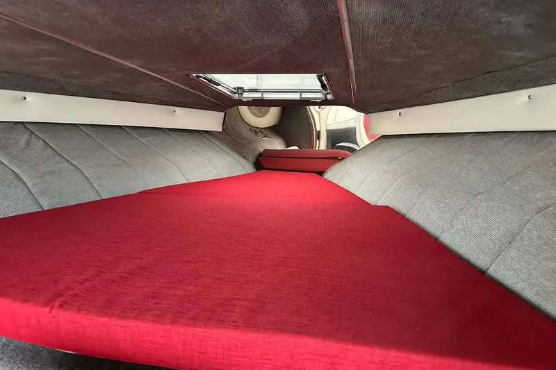 Slide: The Image of Interior cabin of 1987 IMP 255 Eleganza with red and gray upholstery. - 7