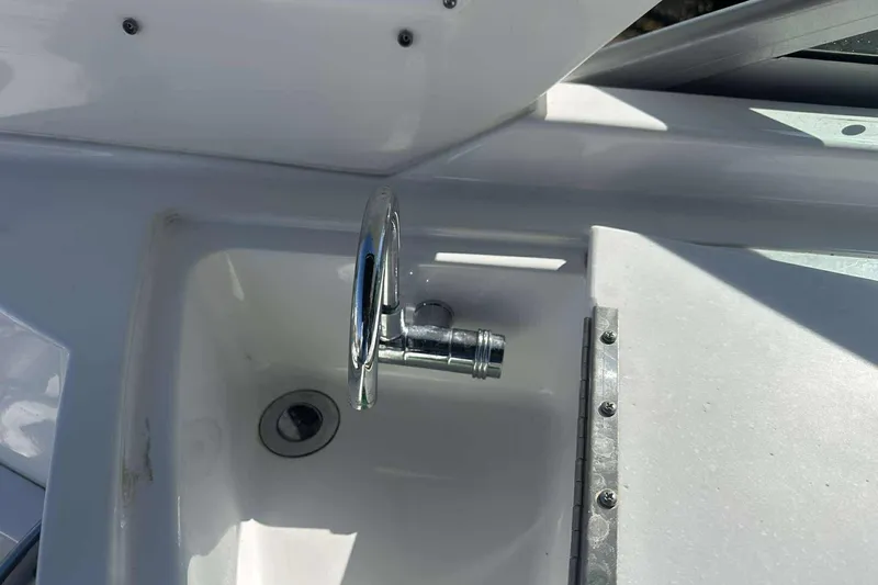 Slide: The Image of Close-up of a 2019 Monterey 295 Sport Yacht sink and faucet. - 16