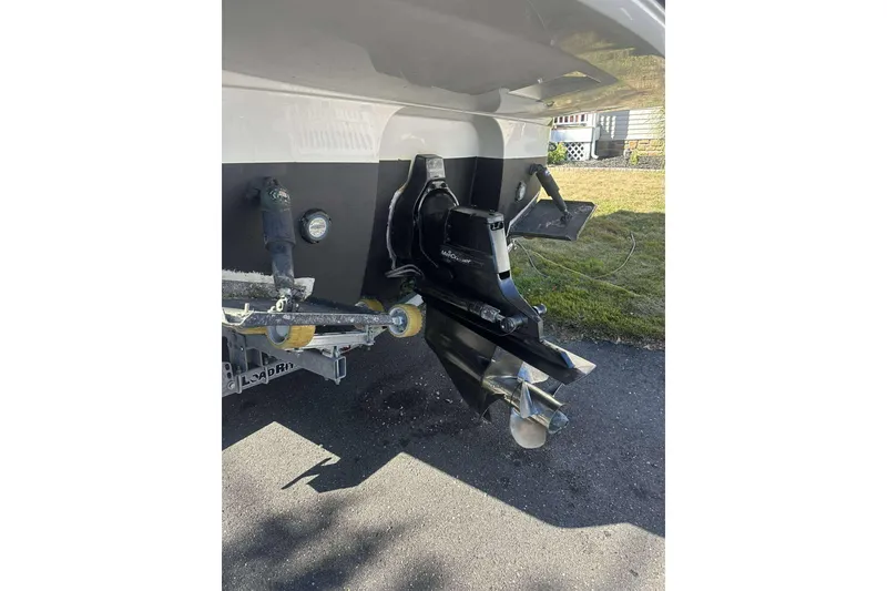 Slide: The Image of 2019 Monterey 295 Sport Yacht stern drive and propeller on trailer. - 9