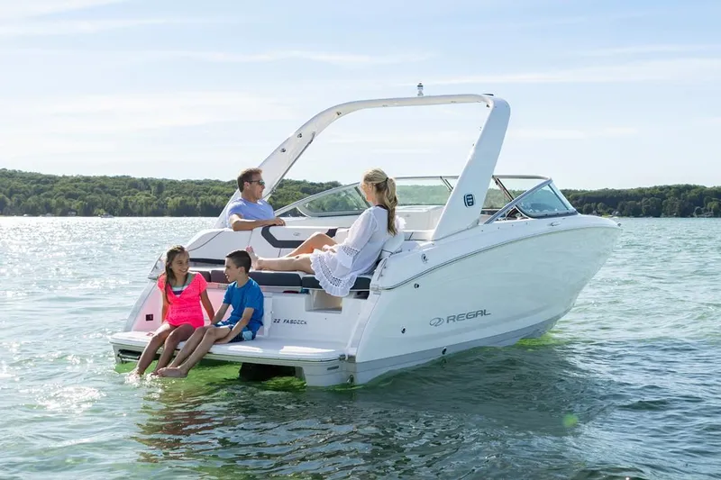 Slide: The Image of Manufacturer Provided Image: Family enjoying a day on a 2020 Regal 22 FasDeck boat on a lake. - 4