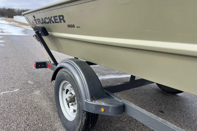 Slide: The Image of 2021 Tracker Grizzly 1860 CC boat on trailer. - 18