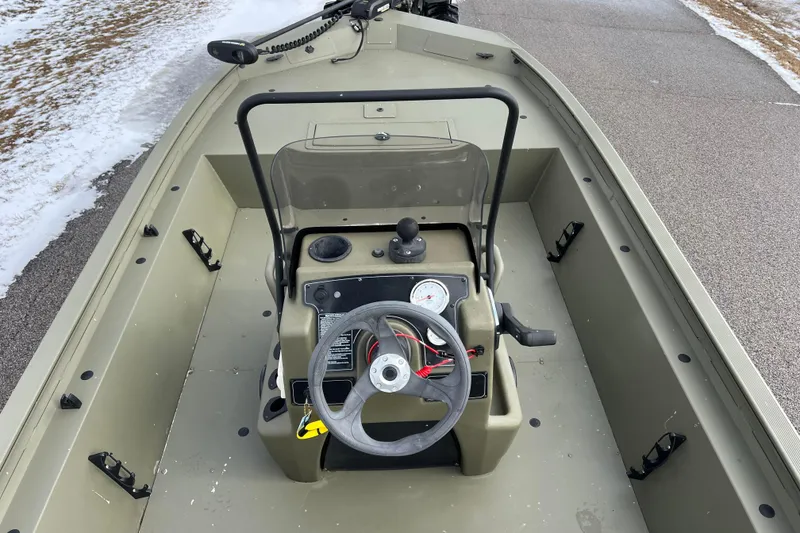 Slide: The Image of Interior view of a 2021 Tracker Grizzly 1860 CC boat. - 3
