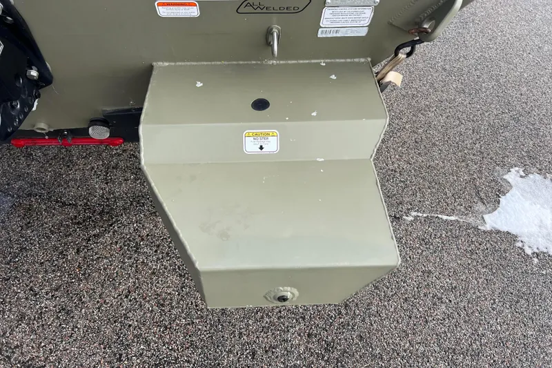 Slide: The Image of Rear view of a 2021 Tracker Grizzly 1860 CC boat. - 39