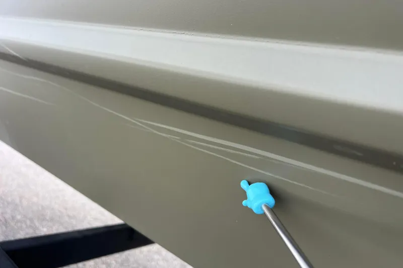 Slide: The Image of Scratches on Tracker Grizzly 1860 CC boat hull, 2021 model. - 41