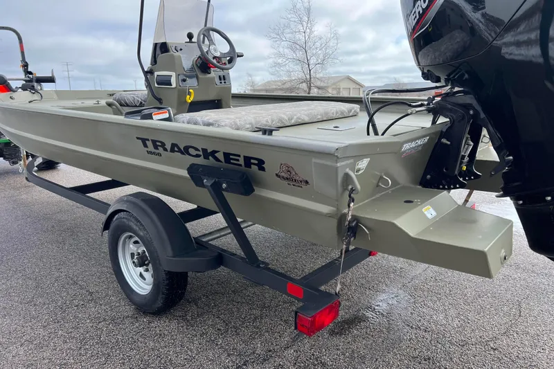 Slide: The Image of 2021 Tracker Grizzly 1860 CC boat on trailer, exterior view. - 6