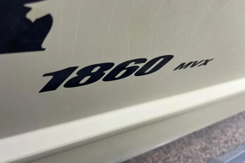 Slide: The Image of Close-up of Tracker Grizzly 1860 CC lettering, model year 2021. - 7