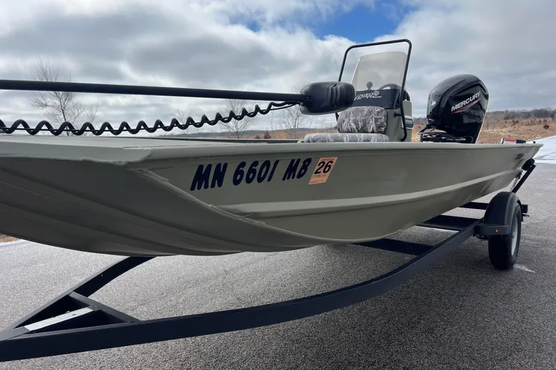 Slide: The Image of 2021 Tracker Grizzly 1860 CC boat on trailer, side view. - 9