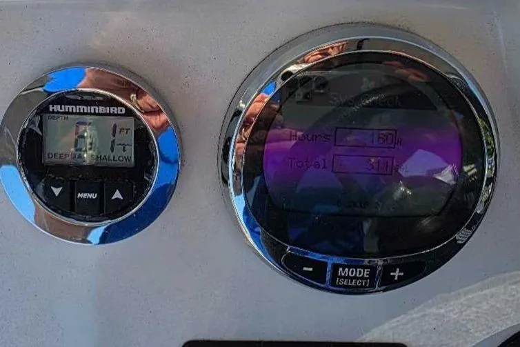 Slide: The Image of Close-up of 2024 Zodiac N-ZO 680 dashboard with Humminbird depth gauge. - 12