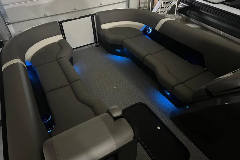 Slide: The Image of Interior of 2026 Evotti 525QL with built-in storage compartment and modern seating. - 11