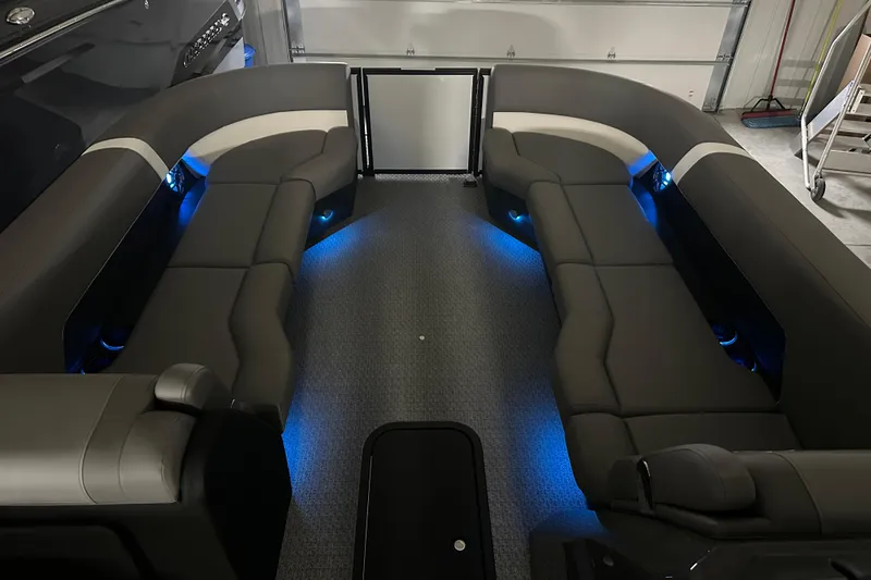 Slide: The Image of Luxurious interior of 2026 Evotti 525QL boat with modern seating and ambient lighting. - 2