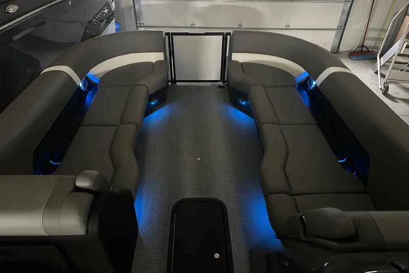 Slide: The Image of Interior of 2026 Evotti 525QL boat with modern dashboard and illuminated controls. - 9