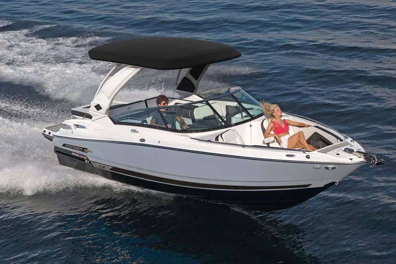 The Image of Manufacturer Provided Image: 2023 Monterey 298SS Super Sport boat cruising on open water, featuring sleek design and black canopy. - 0