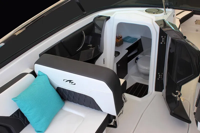 Slide: The Image of Manufacturer Provided Image: 2023 Monterey 298SS Super Sport boat interior with seating and cabin amenities. - 4