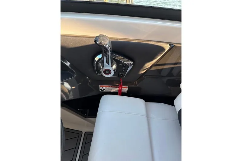 Slide: The Image of Throttle control of 2023 Monterey 298SS Super Sport boat, featuring sleek design and modern controls. - 8