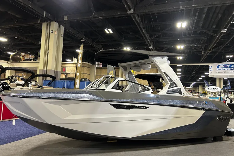 The Image of 2026 Tigé Ultré 23ZX boat displayed at an indoor boat show. - 0