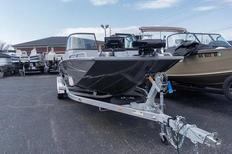 Slide: The Image of 2026 G3 Sportsman 2400 boat on trailer in a dealership lot. - 5