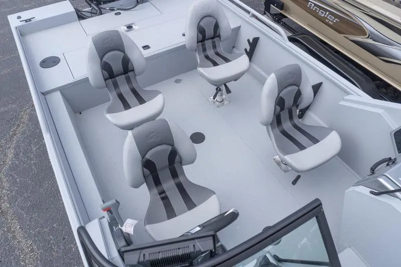 Slide: The Image of 2026 G3 Sportsman 2400 boat interior with four swivel seats. - 19