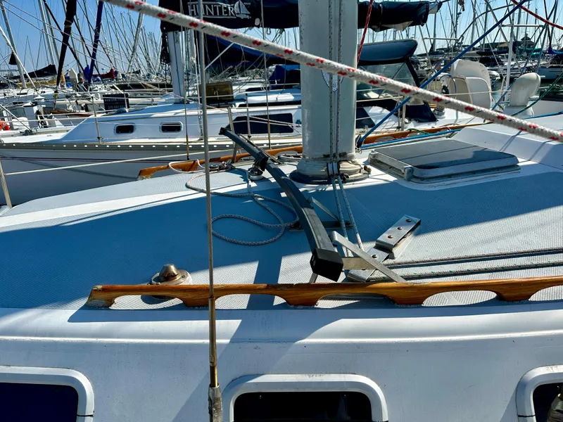 Slide: The Image of Deck of a 1987 Catalina 34 sailboat in harbor. - 2