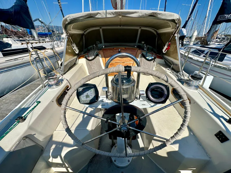 Slide: The Image of Cockpit of a 1987 Catalina 34 yacht in the marina. - 6