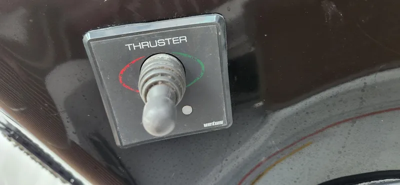 Slide: The Image of Joystick control labeled "Thruster" on a 2007 Cobalt 343 boat. - 23