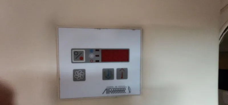 Slide: The Image of Control panel on a 2007 Cobalt 343 boat, featuring various buttons and indicators. - 28