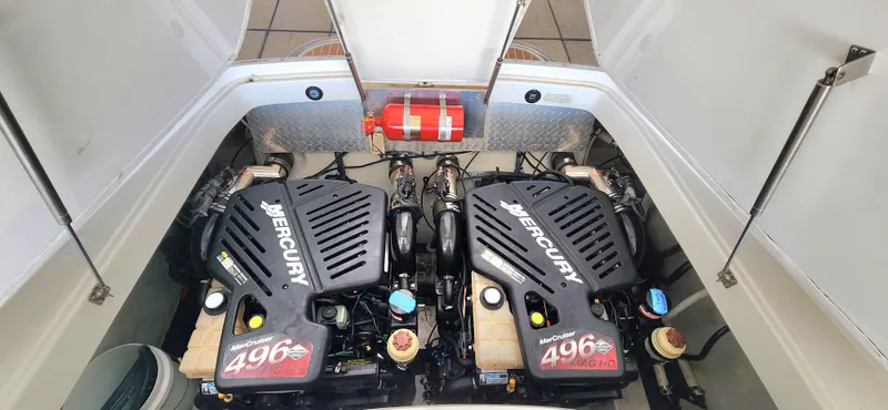 Slide: The Image of Twin Mercury engines in a 2007 Cobalt 343 boat engine compartment. - 31