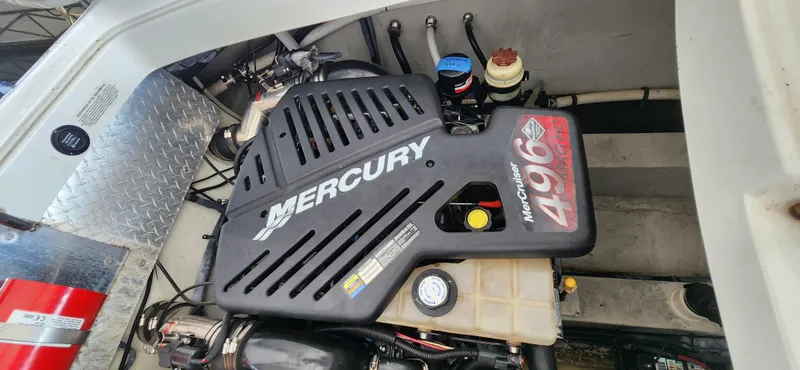 Slide: The Image of Engine compartment of a 2007 Cobalt 343 with a Mercury 496 engine. - 32