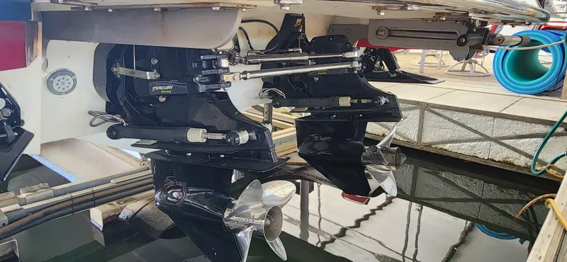 Slide: The Image of 2007 Cobalt 343 boat with dual outboard motors in a marina setting. - 37