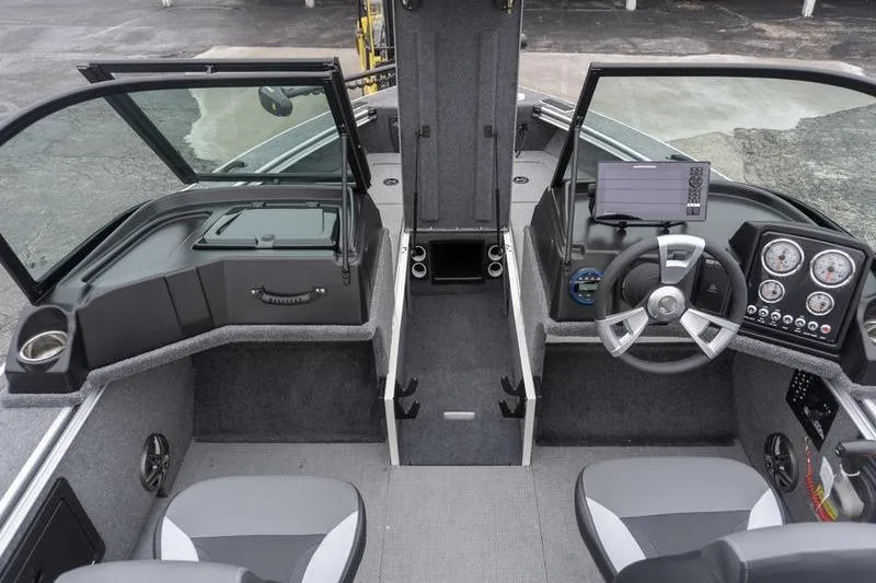 Slide: The Image of 2026 G3 Angler V1750 SF boat interior with modern dashboard and seating. - 11