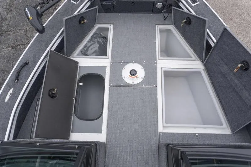 Slide: The Image of 2026 G3 Angler V1750 SF boat interior with open storage compartments. - 17