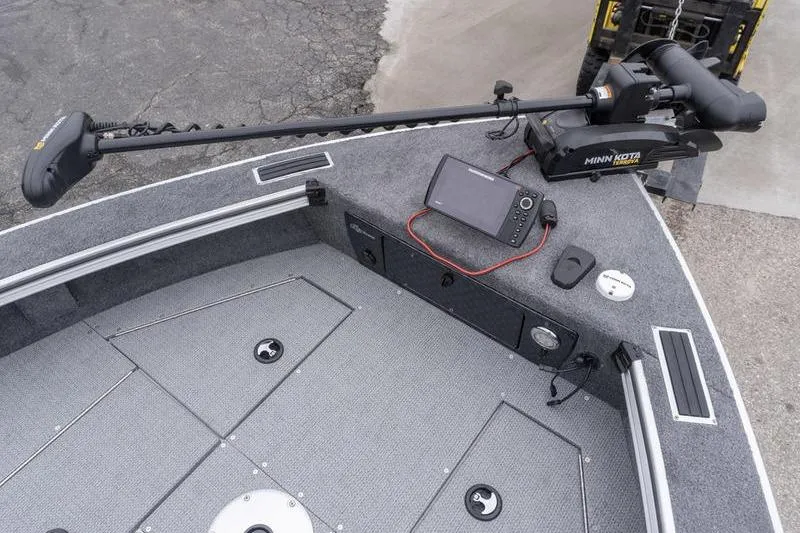 Slide: The Image of 2026 G3 Angler V1750 SF boat deck with Minn Kota trolling motor and fish finder. - 19