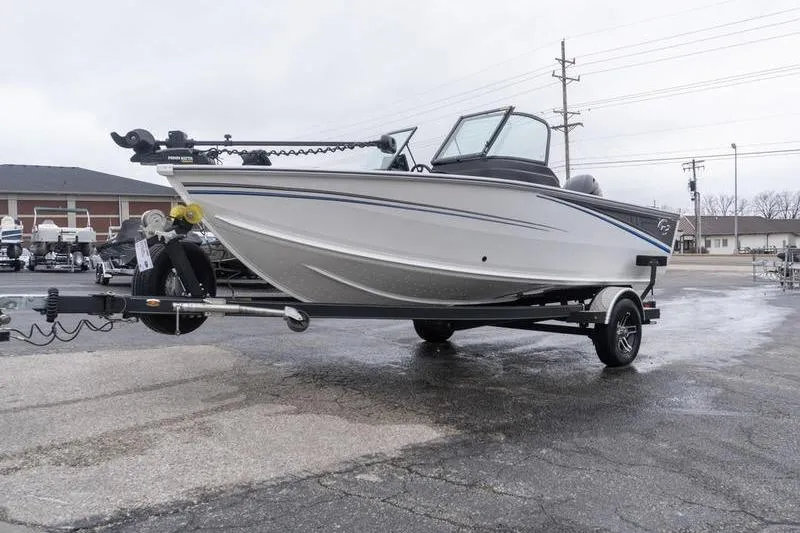 Slide: The Image of 2026 G3 Angler V1750 SF boat on trailer in parking lot. - 4