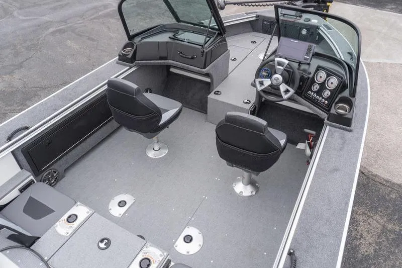 Slide: The Image of 2026 G3 Angler V1750 SF boat interior with dual seats and modern dashboard. - 9