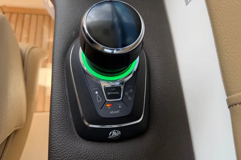 Slide: The Image of Joystick control on 2020 Sea Ray Sundancer 320 Outboard boat dashboard. - 13