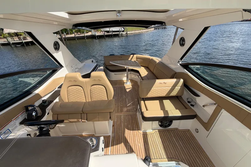 Slide: The Image of 2020 Sea Ray Sundancer 320 Outboard interior with luxurious seating and elegant design. - 14