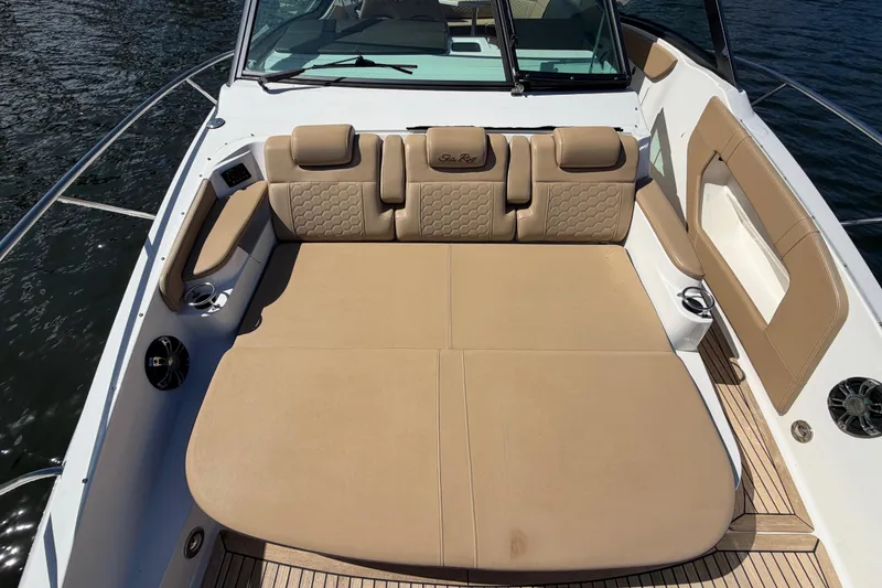 Slide: The Image of 2020 Sea Ray Sundancer 320 Outboard boat with spacious tan seating area. - 24