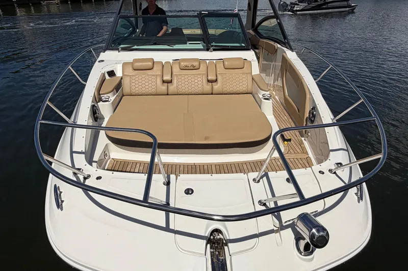 Slide: The Image of 2020 Sea Ray Sundancer 320 Outboard with spacious deck and luxurious seating on water. - 26