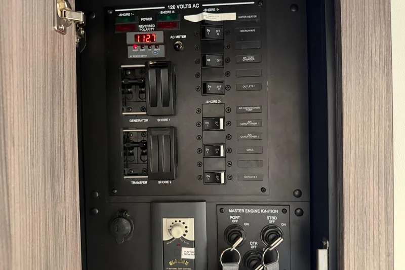 Slide: The Image of Electrical control panel on a 2020 Sea Ray Sundancer 320 Outboard boat. - 37