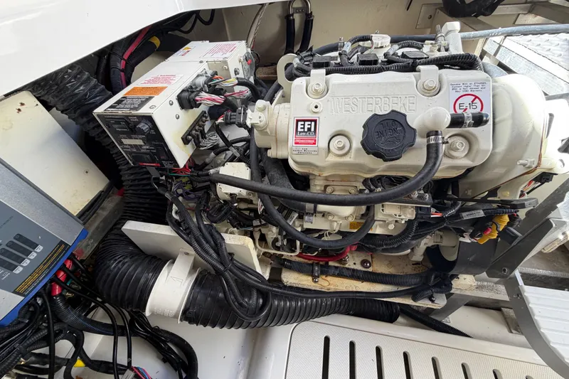 Slide: The Image of Engine compartment of 2020 Sea Ray Sundancer 320 Outboard with Westerbeke generator. - 39