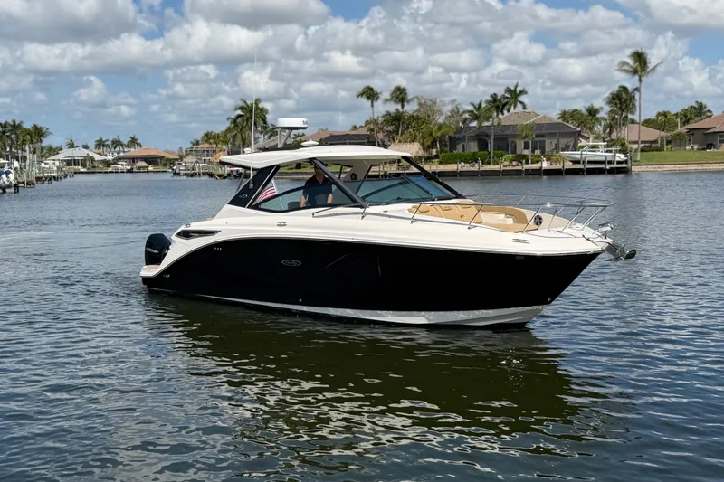 Slide: The Image of 2020 Sea Ray Sundancer 320 Outboard cruising on a sunny day in a scenic waterway. - 4