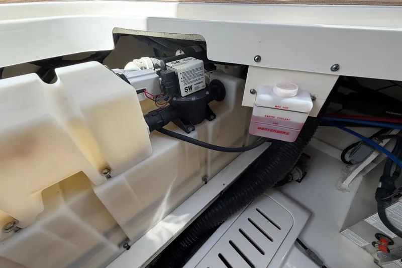 Slide: The Image of Engine compartment of 2020 Sea Ray Sundancer 320 Outboard with coolant system visible. - 42