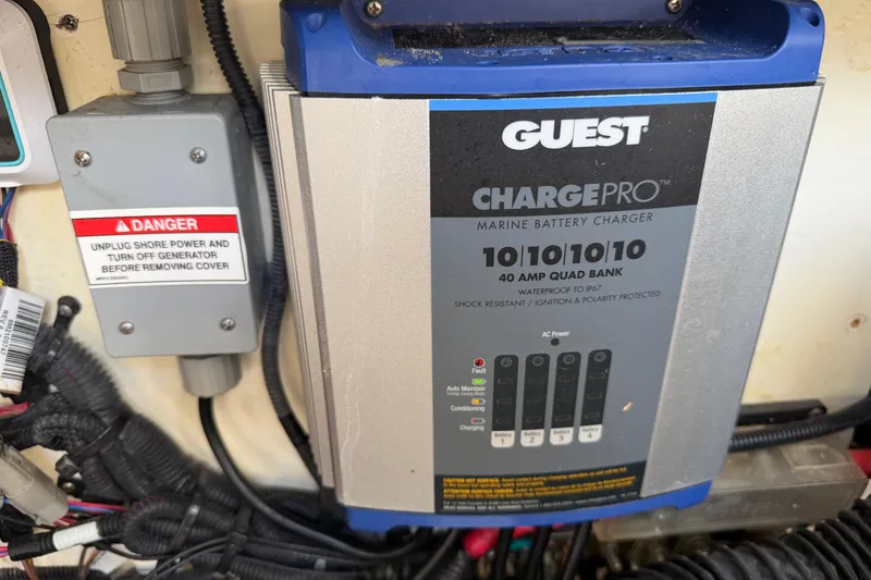 Slide: The Image of Marine battery charger in a 2020 Sea Ray Sundancer 320 Outboard boat. - 44