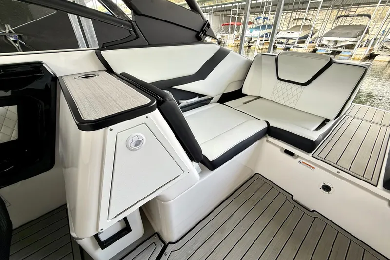 Slide: The Image of 2025 Yamaha Boats 252SE interior with sleek seating and modern design. - 25
