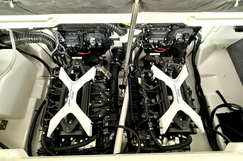 Slide: The Image of 2025 Yamaha Boats 252SE engine compartment showcasing dual high-performance engines. - 30