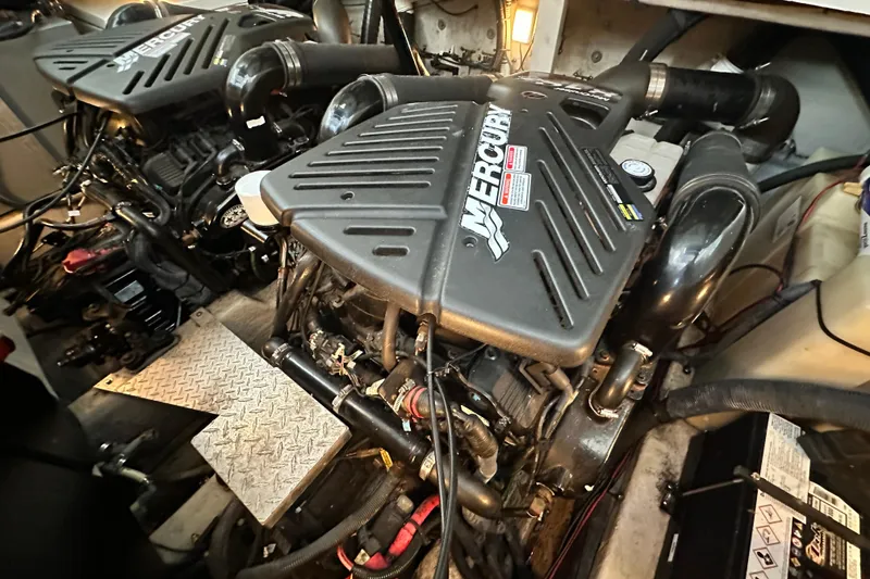 Slide: The Image of Engine room of 2005 Sea Ray 360 Sundancer with twin MerCruiser engines. - 87
