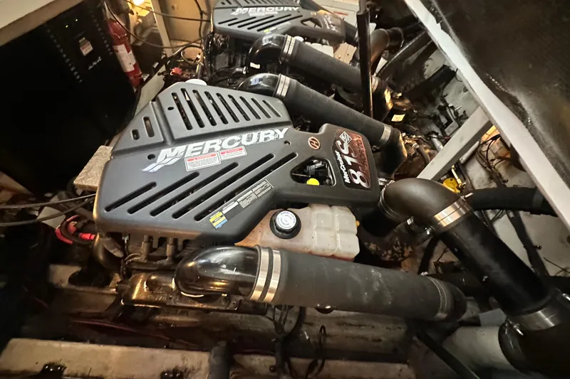 Slide: The Image of Engine room of 2005 Sea Ray 360 Sundancer with Mercury 8.1 engines. - 89
